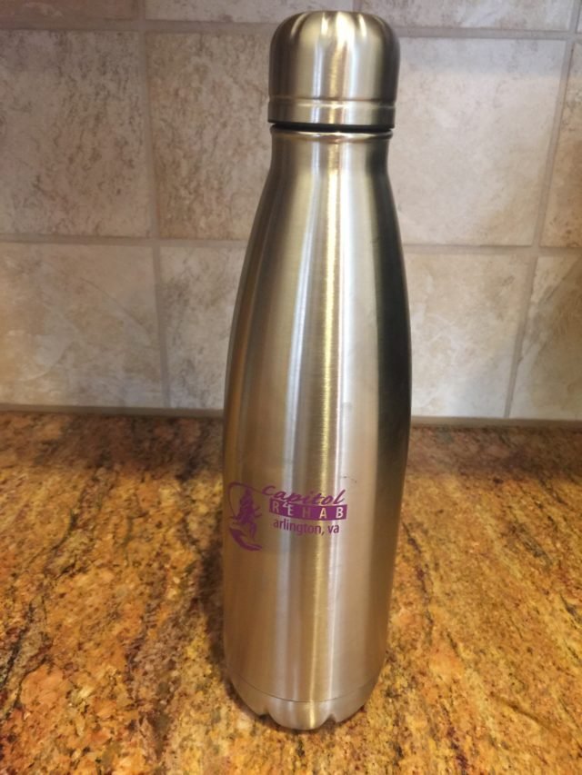 Stainless steel water bottle with Capitol Rehab logo